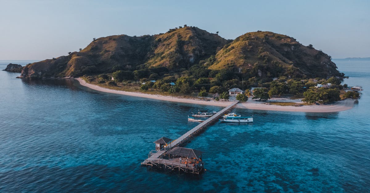 Aerial view of a scenic island with a pier in East Nusa Tenggara, Indonesia.
